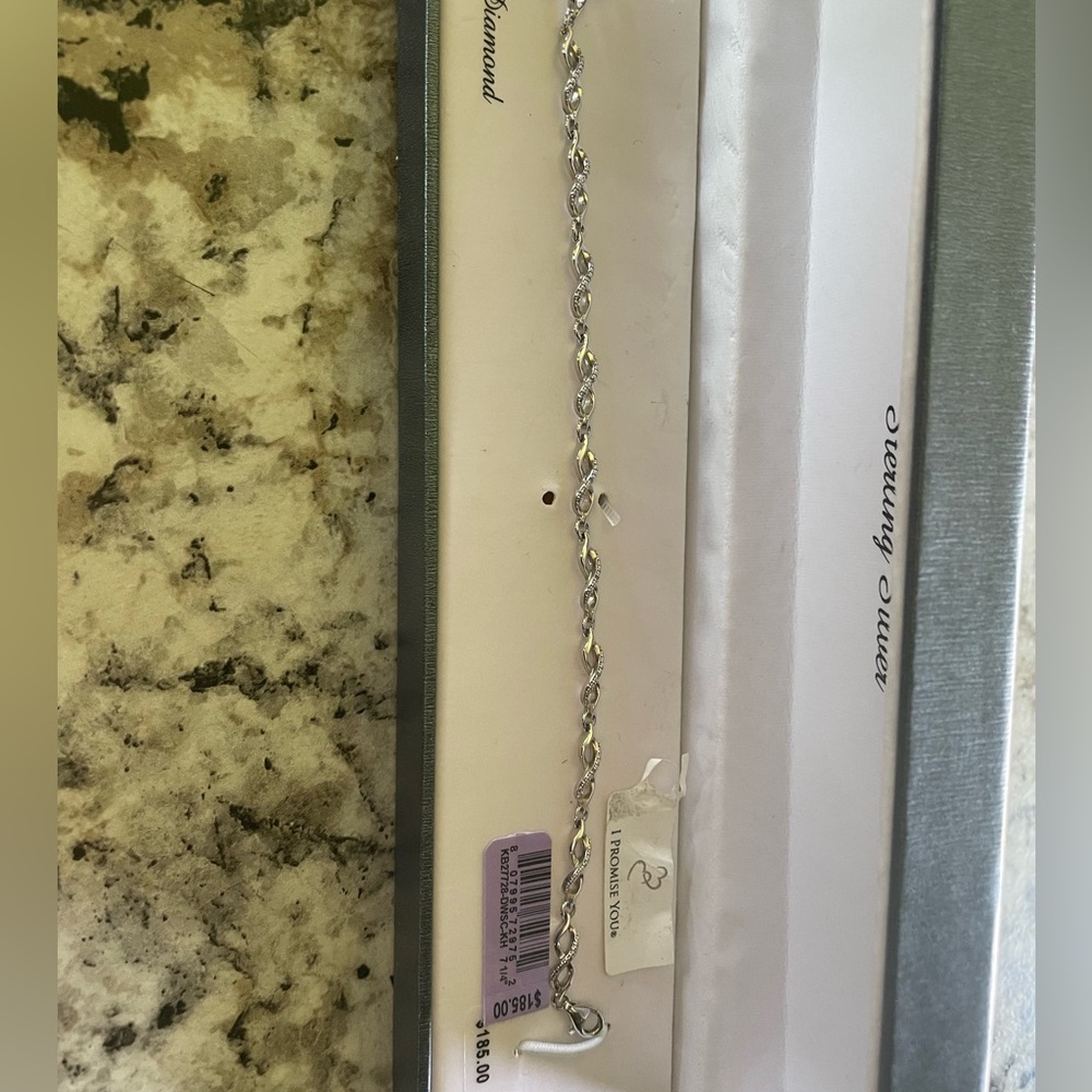 Never worn silver diamond bracelet